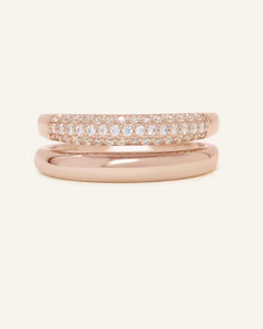 Pave Pair Ring | Elate in rose gold, resting on a warm linen background