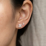Ear stack featuring 18k rose gold Petite Princess Mosaic Moissanite Stud paired with a small round solitaire stud.