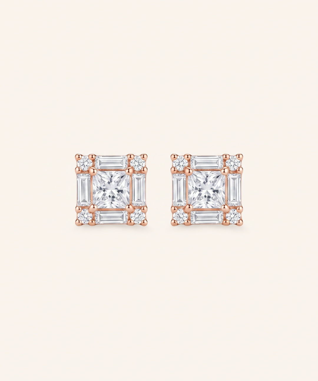 Pair of Petite Princess Mosaic Moissanite Stud Earrings in 18k rose gold vermeil with geometric baguette halo.