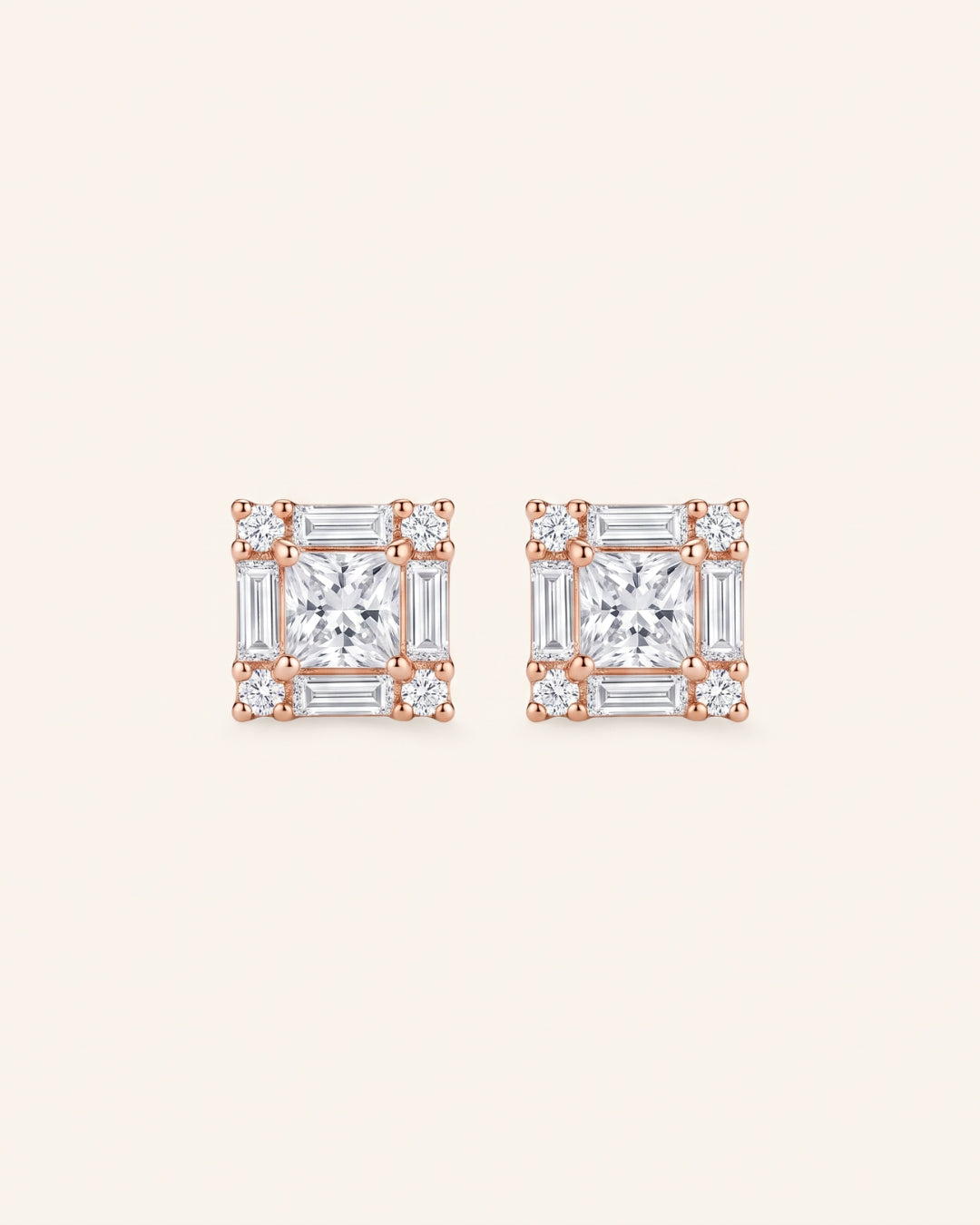 Pair of Petite Princess Mosaic Moissanite Stud Earrings in 18k rose gold vermeil with geometric baguette halo.