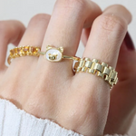 A model wearing a yellow gold ring