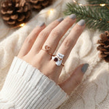 Polar Bear Garnet Ring in rose gold, worn on a model