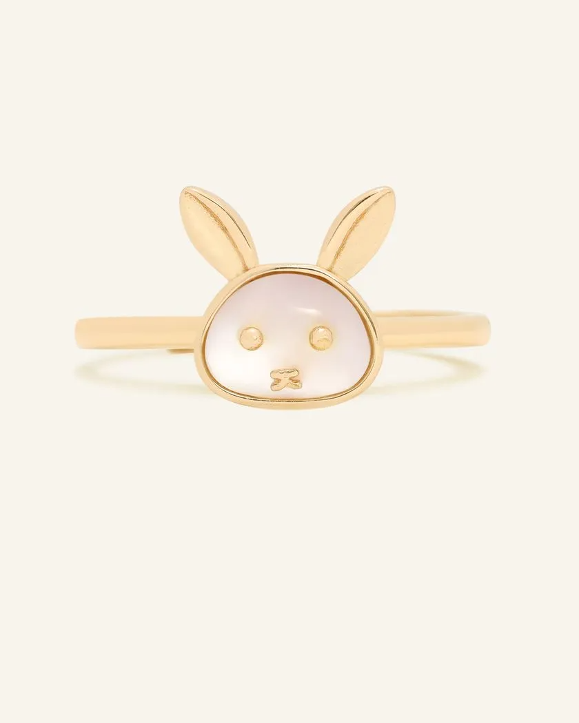 Rabbit Zodiac Ring featuring a delicate mother of pearl face framed in yellow gold with charming bunny ear details, symbolizing elegance and gentleness.