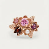 Main product image of the Rosette Floral Cluster Ring in 18k rose gold with Pink Moissanite and mixed gemstones.