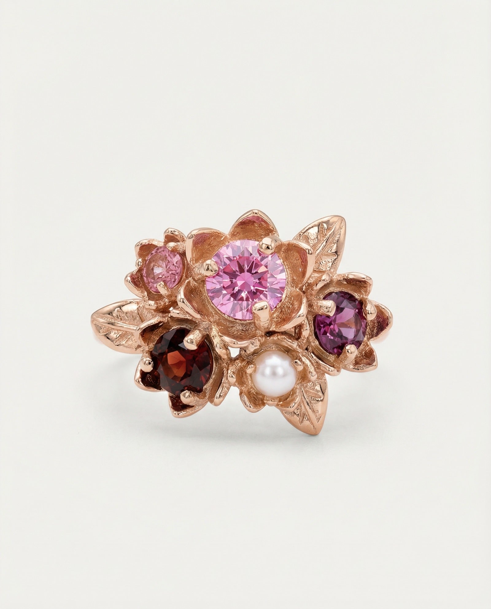 Main product image of the Rosette Floral Cluster Ring in 18k rose gold with Pink Moissanite and mixed gemstones.
