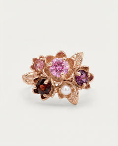 Main product image of the Rosette Floral Cluster Ring in 18k rose gold with Pink Moissanite and mixed gemstones.