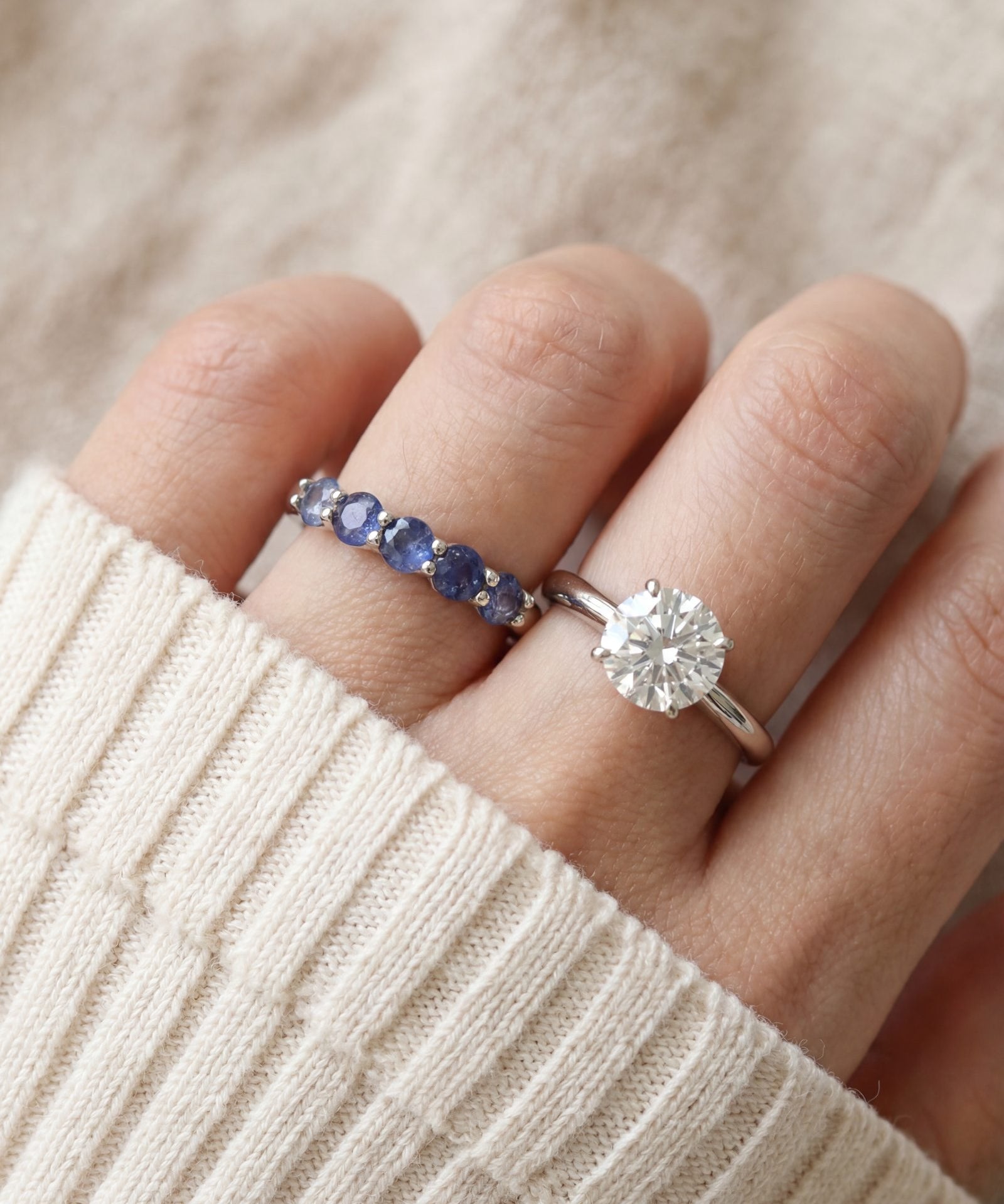 Sapphire Half Eternity Band in silver, worn on a model