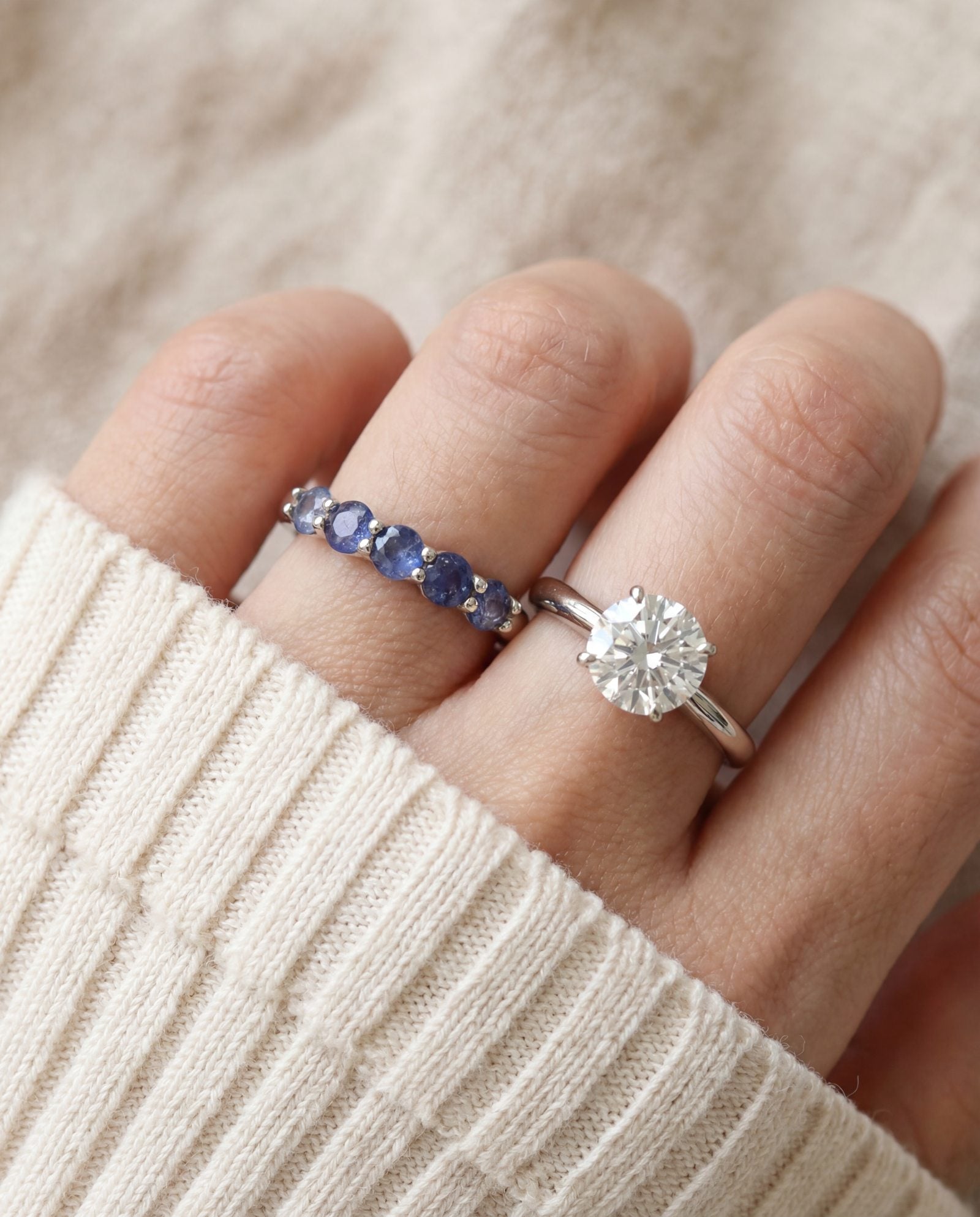 Sapphire Half Eternity Band in silver, worn on a model