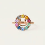 Close-up of the Smiley Ring | Moissanite in rose gold, resting on a warm linen background