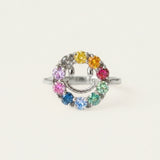 Smiley Ring | Moissanite in silver, resting on a warm linen background