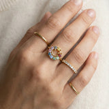 Smiley Ring | Moissanite in yellow gold, worn on a model