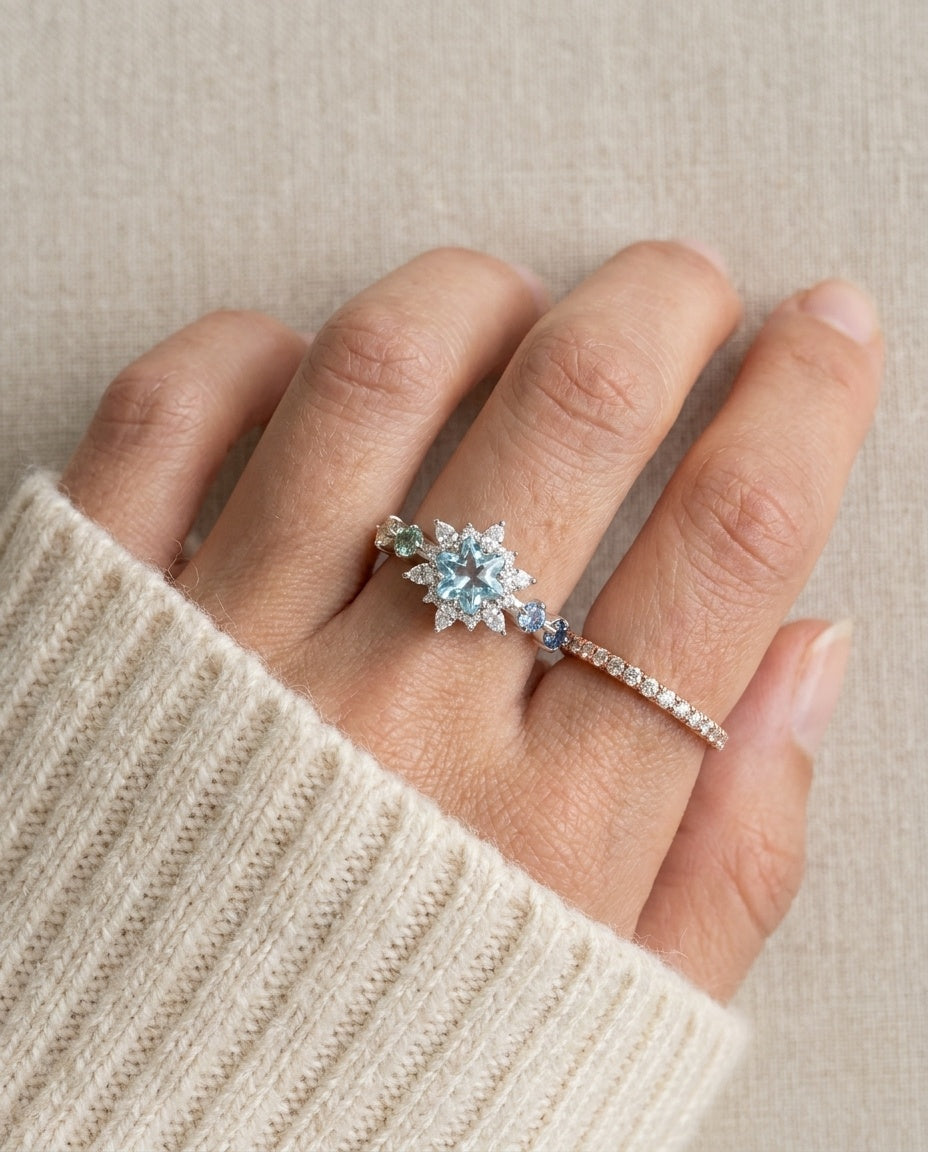 Starburst Snowflake Ring in silver, worn on a model