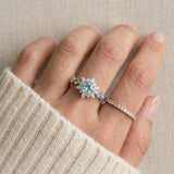 Starburst Snowflake Ring in silver, worn on a model