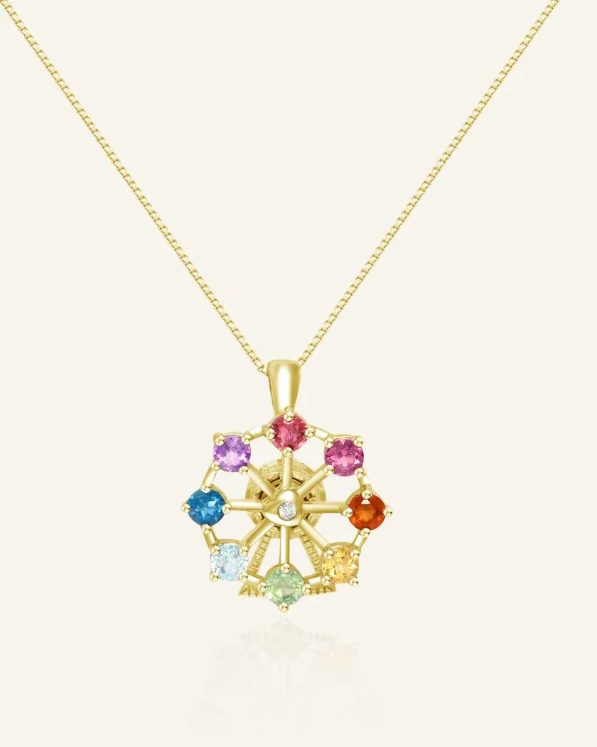 Whimsical necklace with natural colored gemstones and an interactive spinning ferris wheel design yellow gold