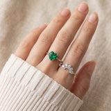 Paraiba Topaz Heart Ring | XL, laid flat on a tabletop