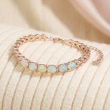 Watch Chain Opal Bracelet laid flat on a tabletop