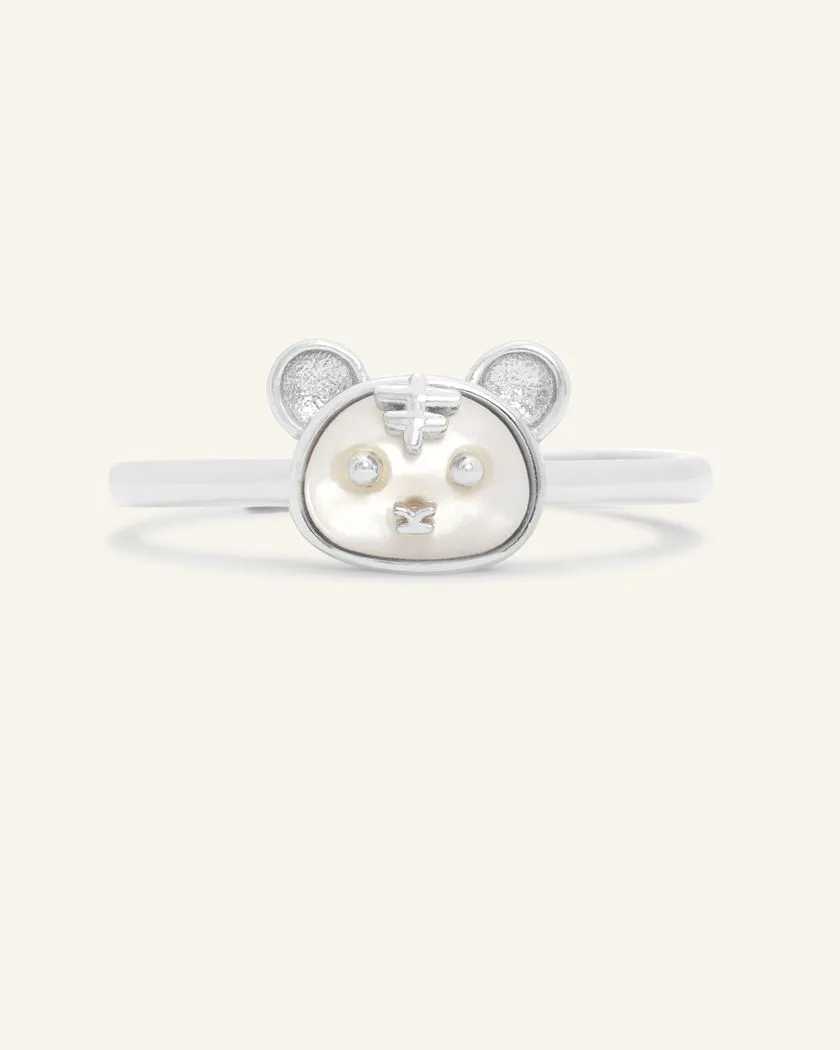 Silver tiger zodiac ring featuring a hand-carved mother of pearl face with intricate detailing of tiger ears and facial features.