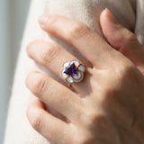 Lifestyle model shot of the Violet Grande Bloom Ring highlighting the bold floral design and slim comfort-fit band.