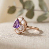 Side profile of Violet Grande Bloom Ring showing the floating stone setting and architectural 18k rose gold structure.