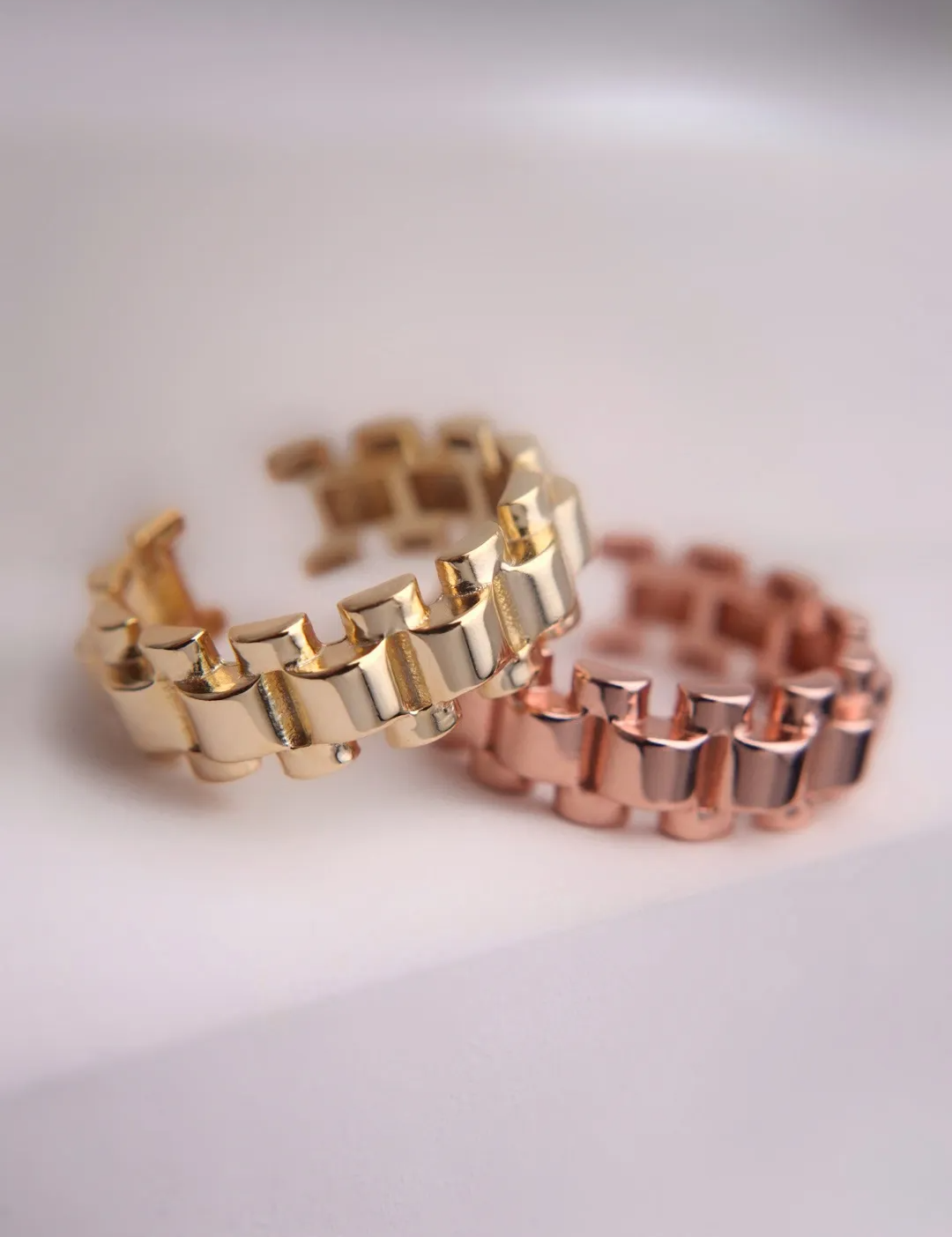Two watch chain link rings taken in a style shot.