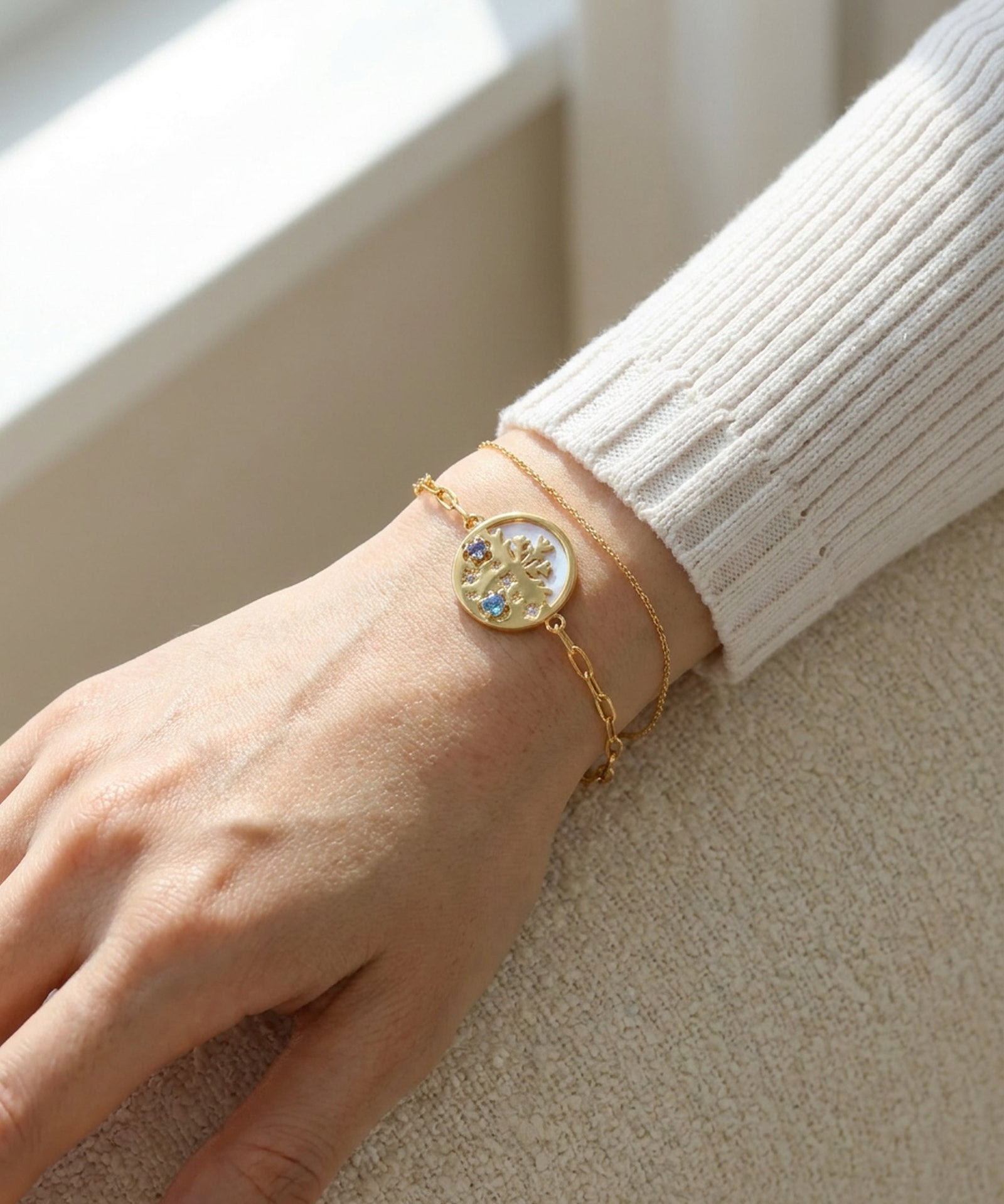 Winterscape Mother of Pearl Bracelet in yellow gold, worn on a model