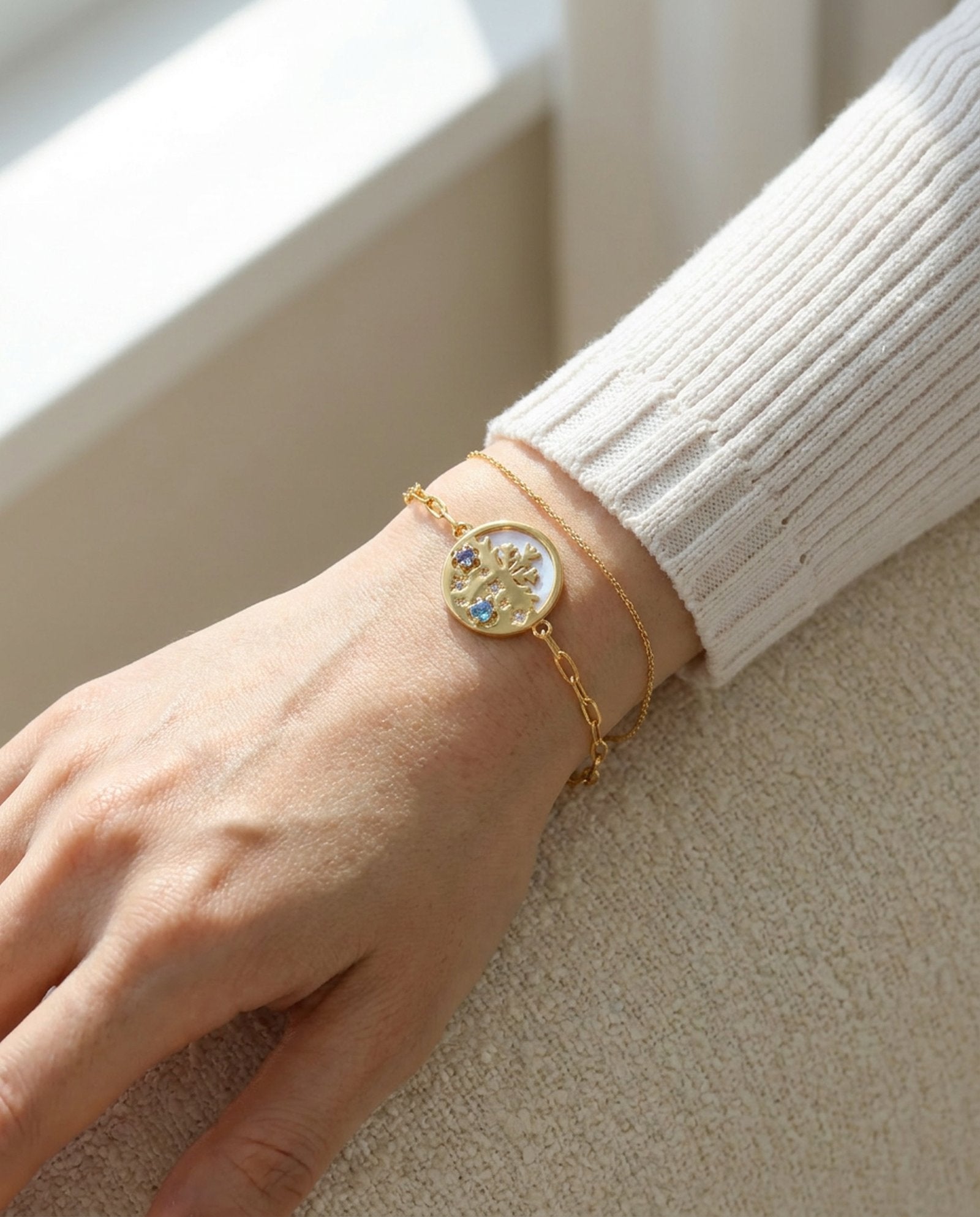 Winterscape Mother of Pearl Bracelet in yellow gold, worn on a model
