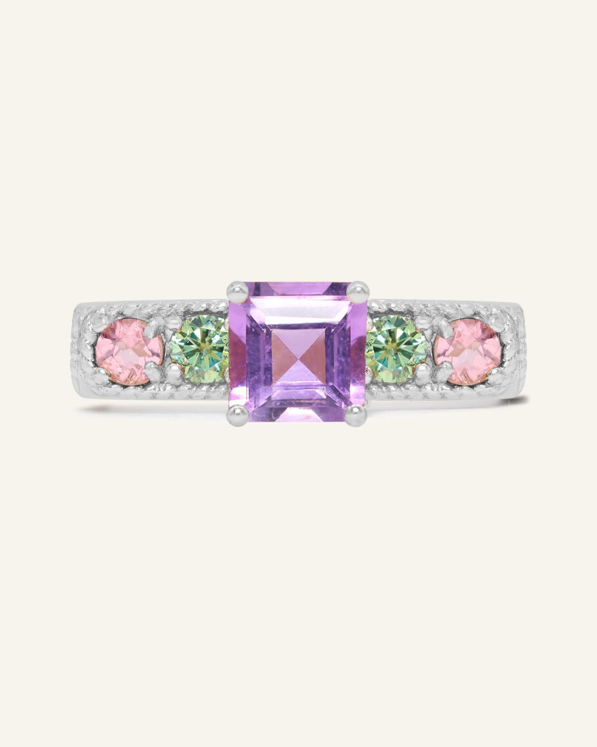 Arc de Triomphe Amethyst Ring in silver, front view of the amethyst and colourful gemstone band on warm ivory