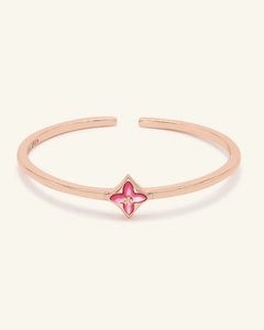 Clover Monogram Cuff | Pink Mother of Pearl, resting on a warm linen background