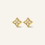 Close-up of a pair of yellow gold clover monogram studs