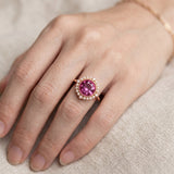 Duchess Pink Topaz Ring in rose gold worn on hand against neutral linen