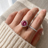 Duchess Pink Topaz Ring in silver worn with a delicate stacking ring in natural sunlight