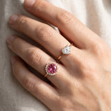 Duchess Pink Topaz Ring styled on hand with a heart-cut ring in warm natural light