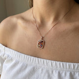 Jewel Box Multi-Gemstone Necklace in rose gold, worn with a white neckline