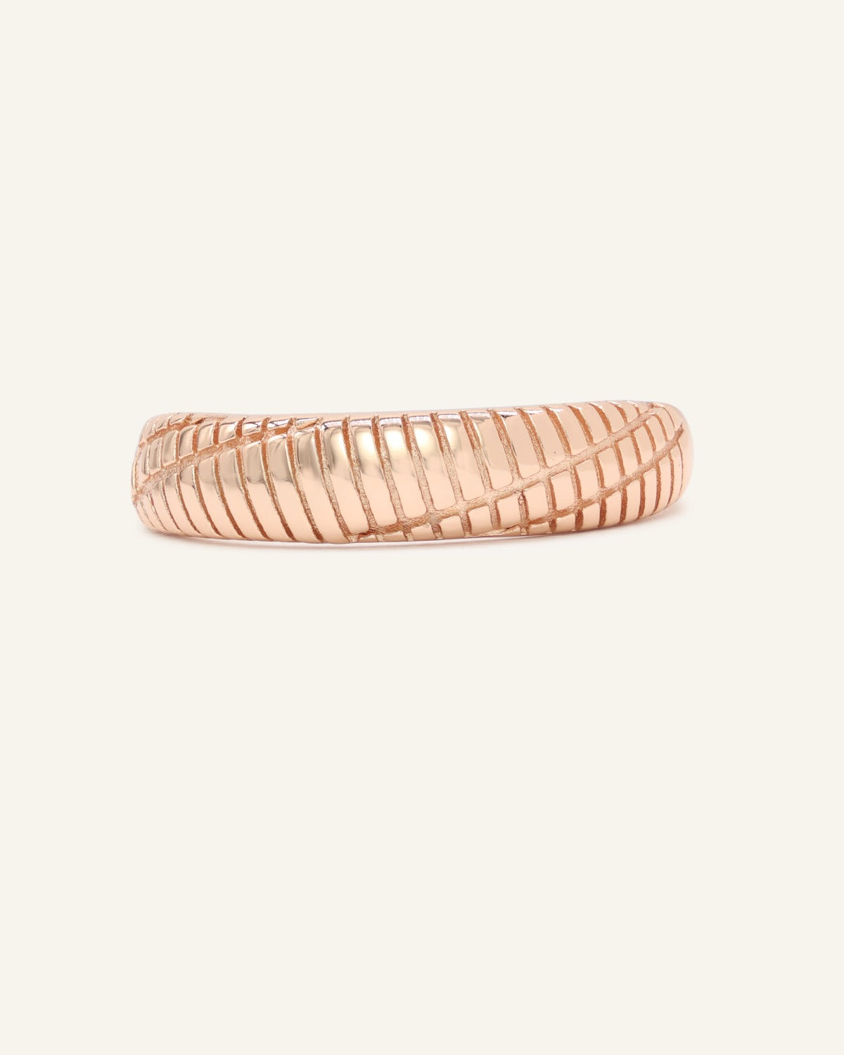 Linear Stripes Band in rose gold, front view of the engraved striped band on warm ivory