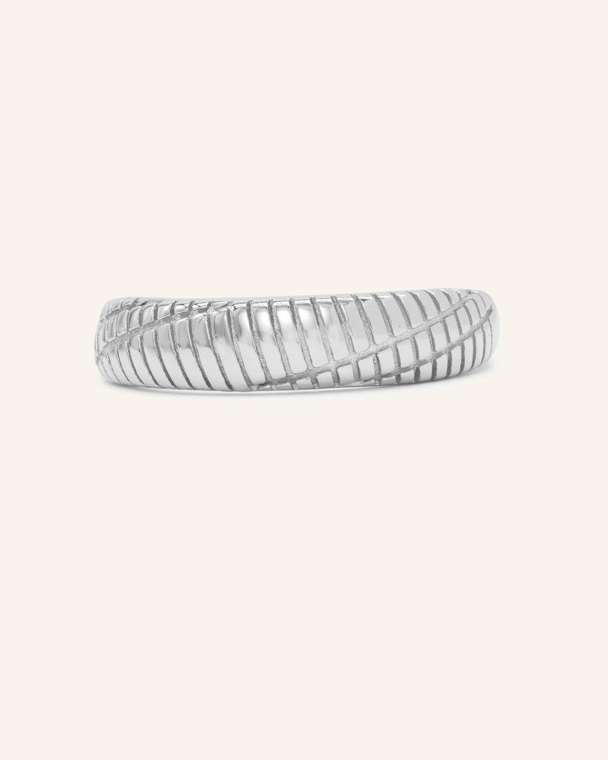 Linear Stripes Band in silver, front view of the engraved striped band on warm ivory