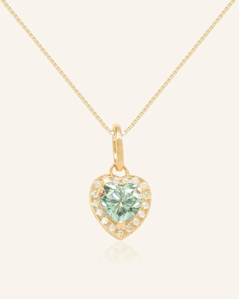 heart-shaped mint moissanite halo necklace in yellow gold vermeil, featuring a sparkling green moissanite center surrounded by a delicate halo of cubic zirconias on a fine chain.