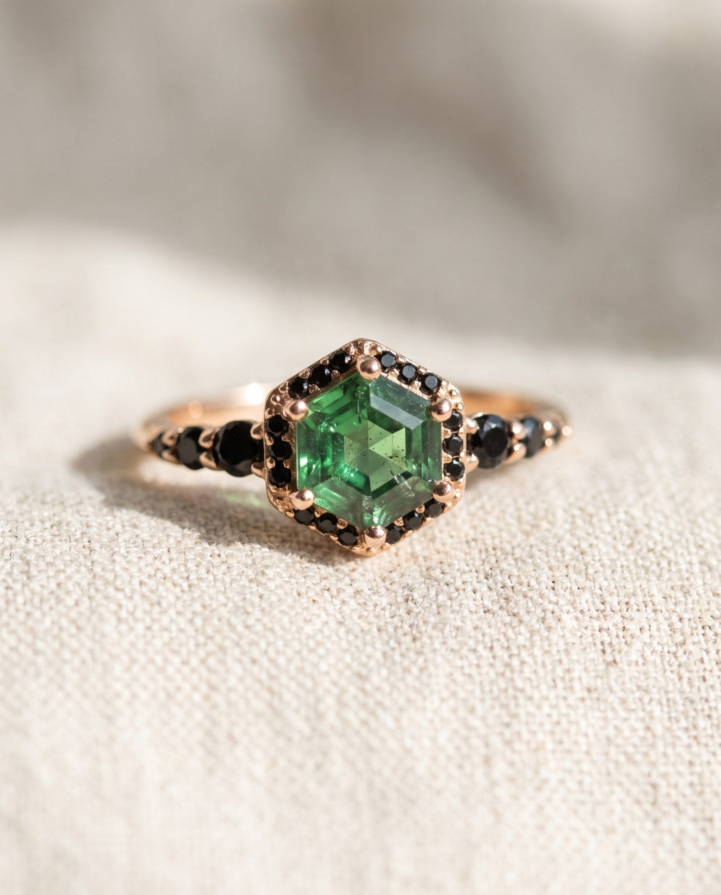 Nocturne Halo Hexagon Ring in yellow gold, lab-grown alexandrite showing green tones with a black CZ halo