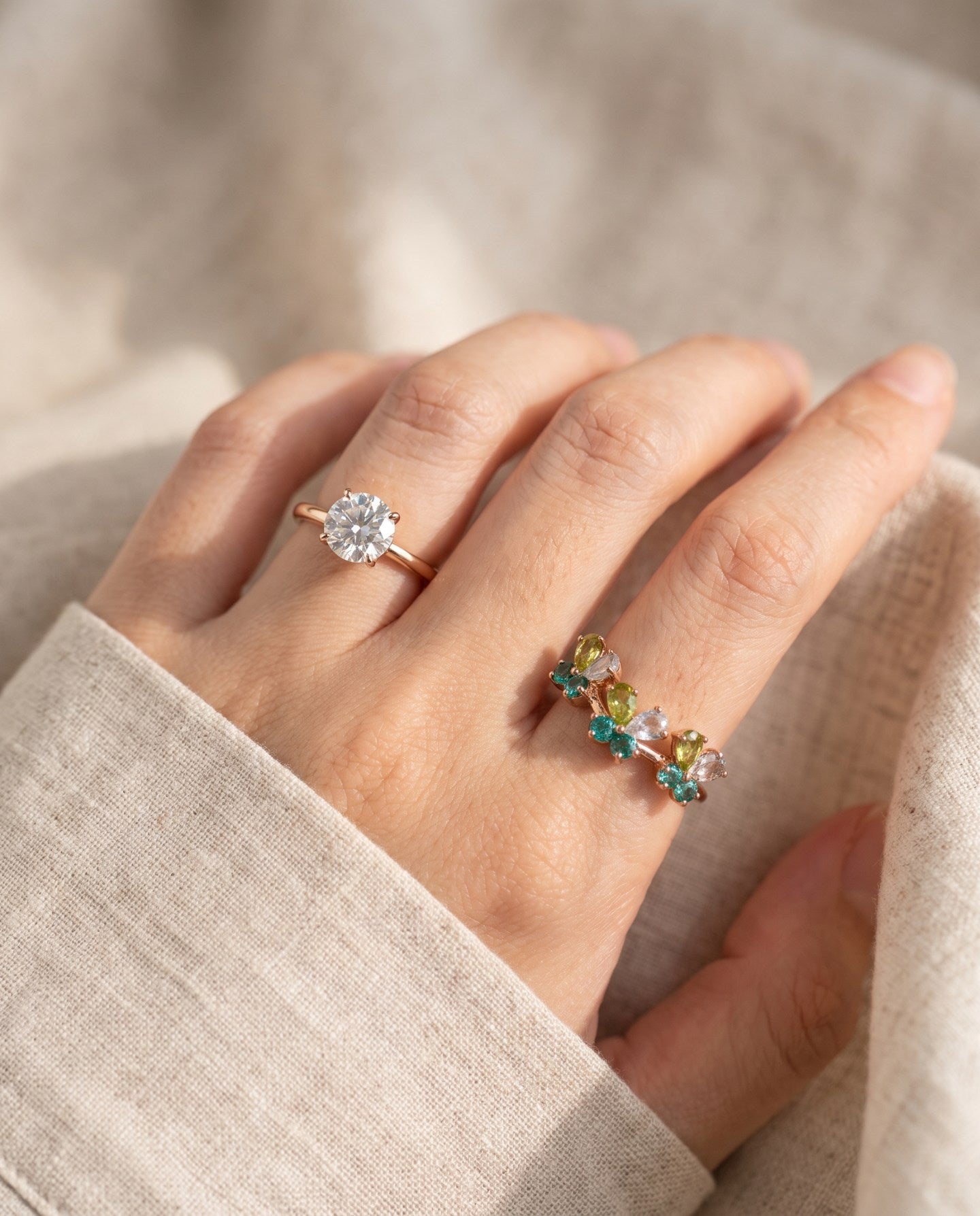 Papillon Butterfly Meadow Ring in yellow gold with peridot and blue topaz butterflies worn on the hand