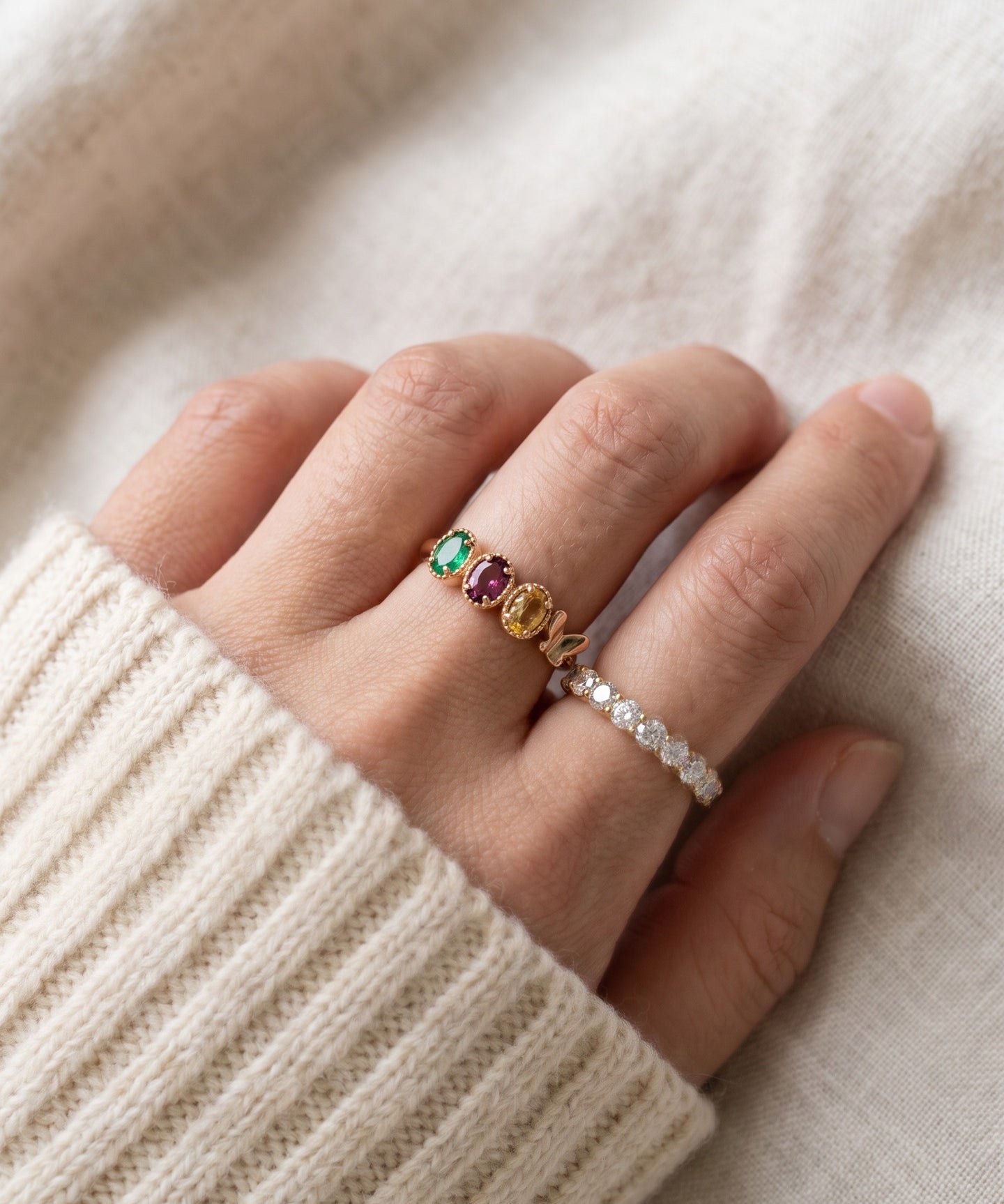 Papillon Trio Gemstone Ring in rose gold, worn on hand