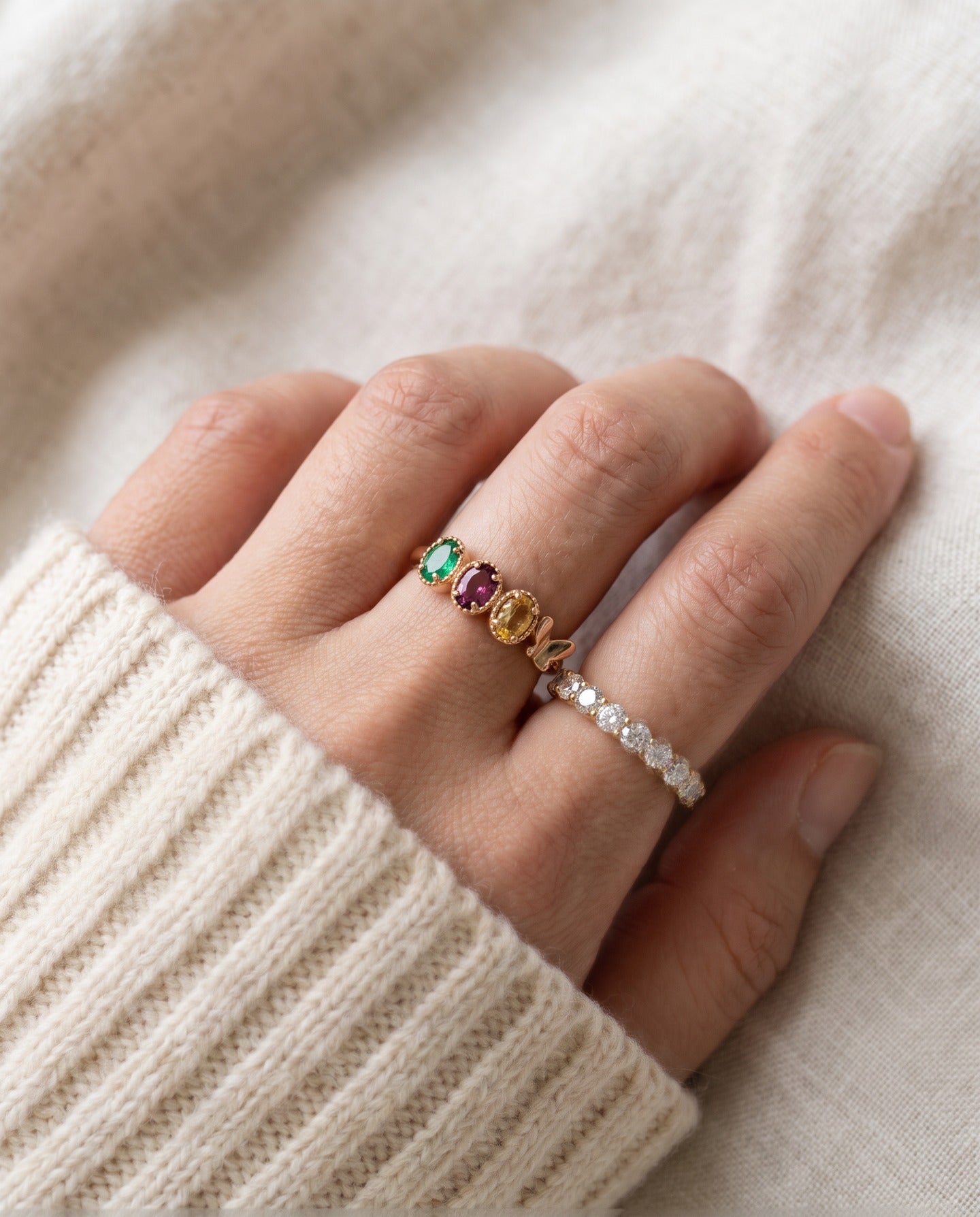 Papillon Trio Gemstone Ring in rose gold, worn on hand
