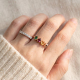 Papillon Trio Gemstone Ring in rose gold, worn stack closeup