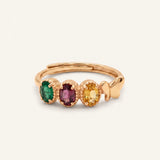 Papillon Trio Gemstone Ring in yellow gold with three oval gemstones and a butterfly detail on warm ivory