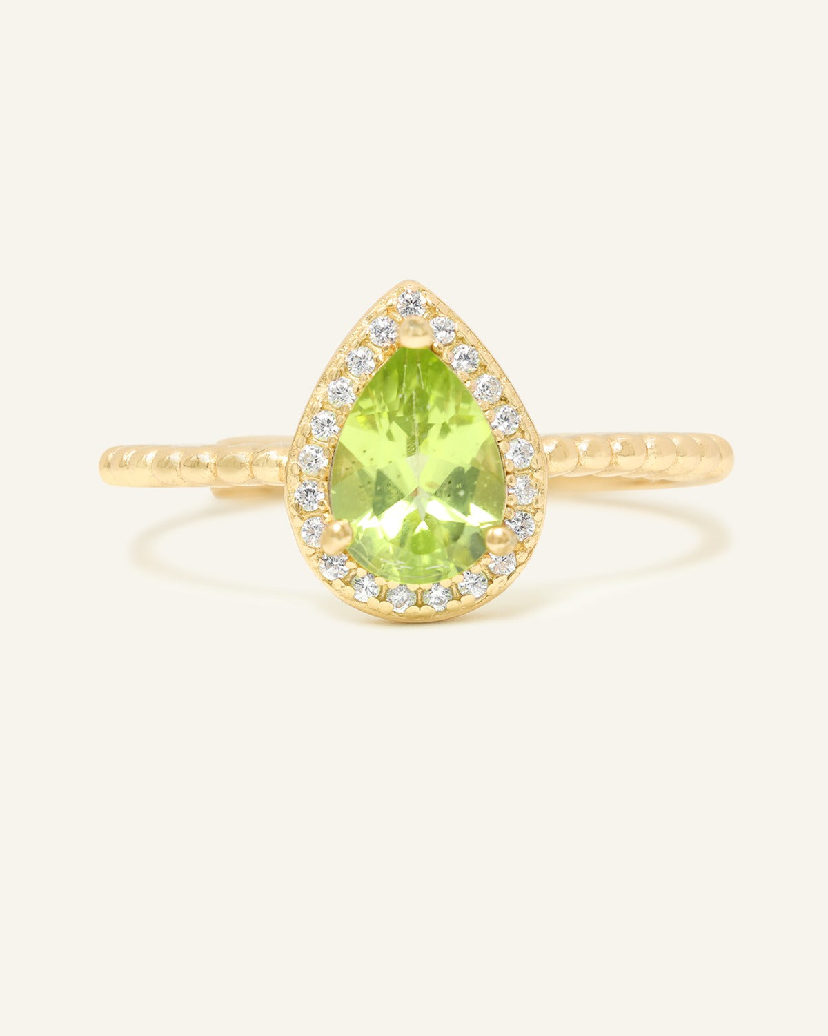 Peridot Teardrop Halo Ring in Yellow Gold front product view