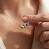 Prism Baguette Rainbow Sapphire Necklace in silver with six multicolour natural sapphires worn at the collarbone