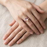 Solstice Pearl & Gemstone Ring with freshwater pearl, amethyst, rhodolite garnet and rose quartz, rose gold worn hands