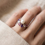 Solstice Pearl & Gemstone Ring with freshwater pearl, amethyst, rhodolite garnet and rose quartz, silver worn closeup