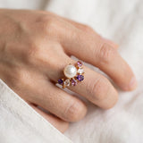 Solstice Pearl & Gemstone Ring with freshwater pearl, amethyst, rhodolite garnet and rose quartz, yellow gold worn