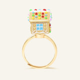 Spinning Gingerbread House Ring in yellow gold, rear view showing the colourful roof and window